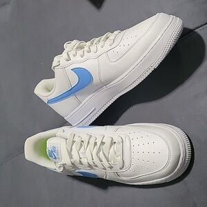 New Air Force 1, size 11.5 women, 10 men's. White/university blue.